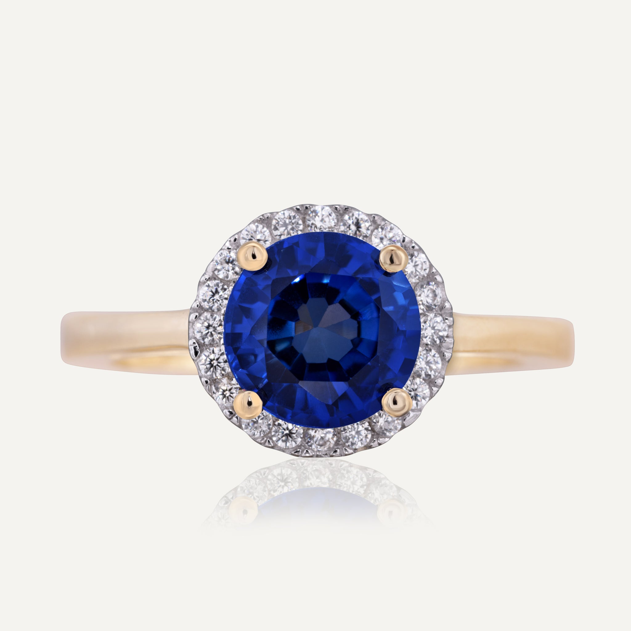 9ct Gold Sapphire Halo Ring.